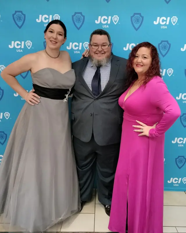 Three members dressed up at the national JCI convention